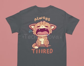 May include: A charcoal grey t-shirt with a cartoon illustration of a tired cat with the text "Always Tired".