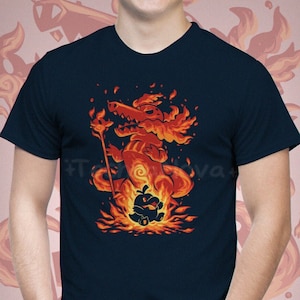 May include: A navy blue t-shirt featuring a graphic of a fiery red dragon holding a torch and standing over a smaller, black creature. The text "NAVY SHIRT" and "Unisex Shirt Style" is printed in white at the bottom of the image.