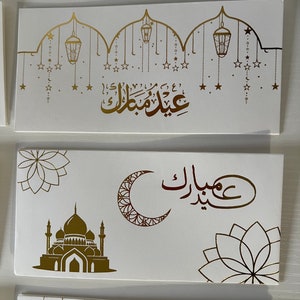 Gouden en witte eid-geldenveloppen