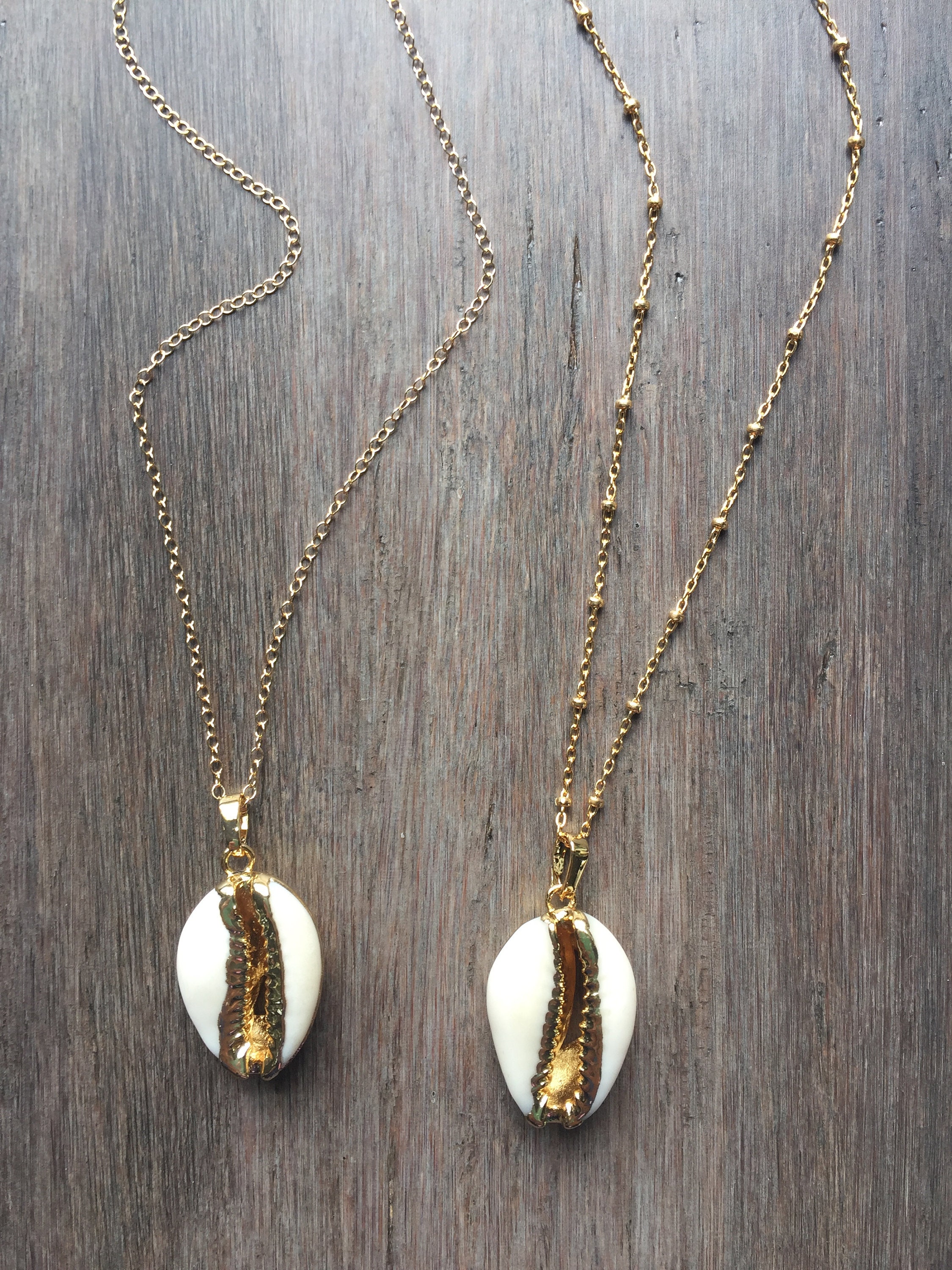 Cowrie on sale necklace gold