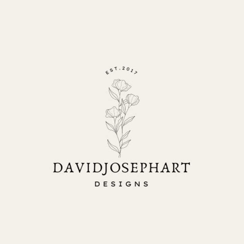 Op de afbeelding: Zwart-witte lijnkunstlogo met een gestileerde bloem met drie bloesems en de tekst "DAVIDJOSEPHART DESIGNS" en "EST. 2017".