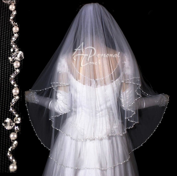 White Wedding Veil with Cascade Layers Soft layers, endless romance. ✨ This cascading veil drapes  main image 4