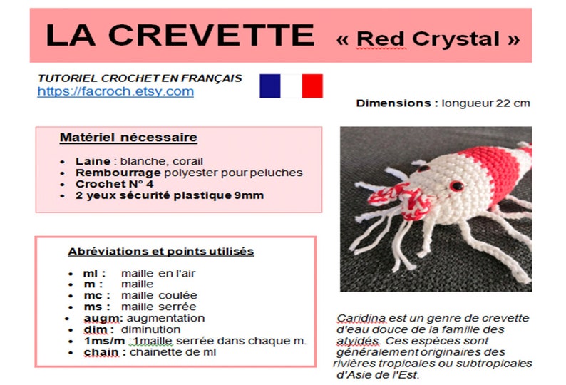 K&ouml;nnte beinhalten: Geh&auml;kelte Garnele, haupts&auml;chlich wei&szlig; mit roten Akzenten, mit schwarzen Sicherheitsaugen und langen wei&szlig;en Antennen. Der Text &bdquo;LA CREVETTE Red Crystal&ldquo; ist &uuml;ber dem Bild zu sehen, zusammen mit franz&ouml;sischem Text und einem H&auml;kel-Tutorial.
