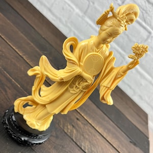 Vintage Oriental Geisha Girl Dancer Figurine Ivory Color on a Black Pedestal Japanese Lady Sculpture Asian Decor Office or Home Table Art