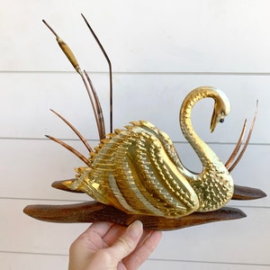 Metal and wood swan wall hanging // Gold toned tin swan on wood base // vintage golden pond life figurine plaque