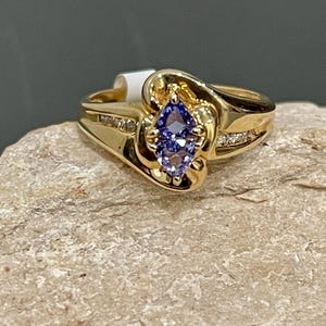 Genuine Tanzanite And Diamond Ring In 14Kt Yellow Gold