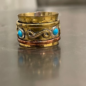 Copper With A Yellow Gold Finish Spinner Band With Blue Turquoise In A Two Tone Design