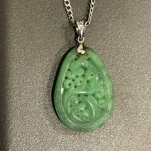 Green Teardrop Jade With Carved Scroll Design With Sterling Silver Chain