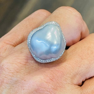 South Sea Baroque Pearl Measuring 19x17mm In An 18KT. White Gold Ring With Diamonds .57Cts.