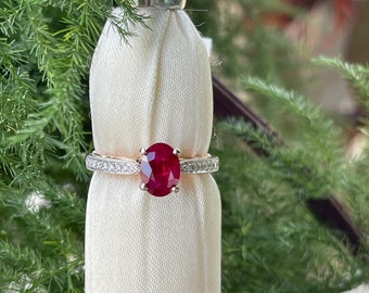 Ruby Oval 1.35CTS. and Diamond Ring .30CTS. in 14kt. White Gold