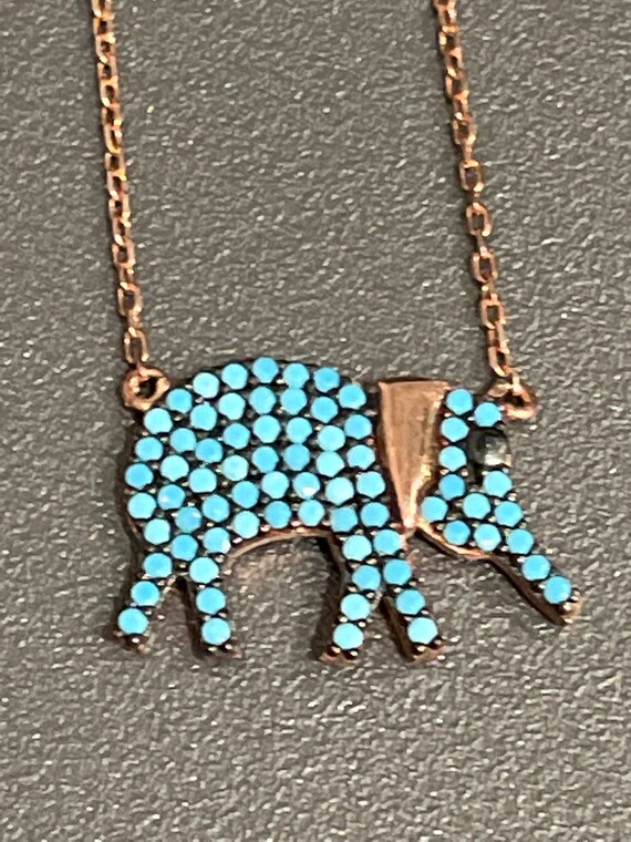 Turquoise elephant best sale necklace
