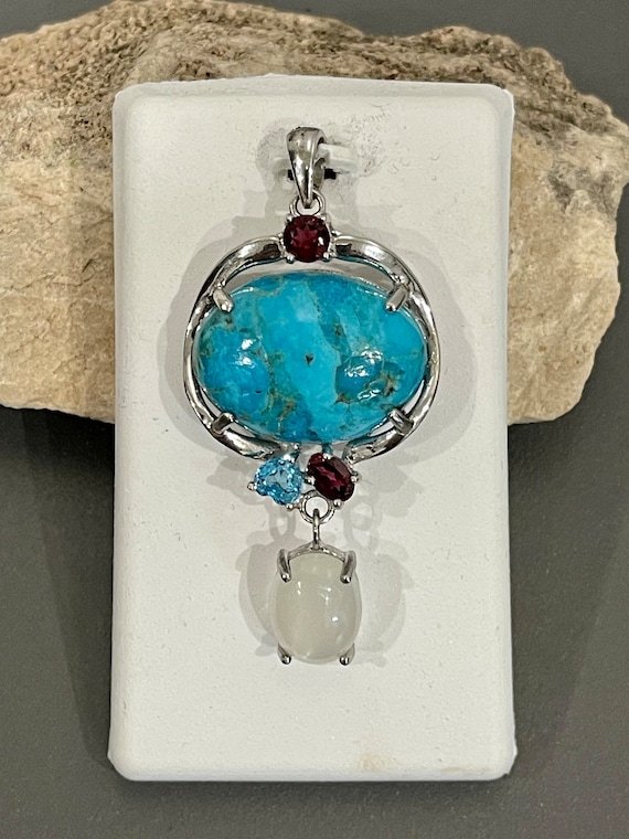 Sterling Silver Turquoise, Garnet, Blue Topaz And 