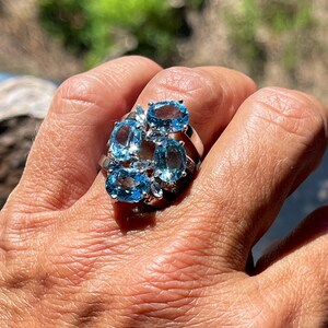 Sterling Silver Wide 4 Stone Oval Shape Blue Topaz Ring