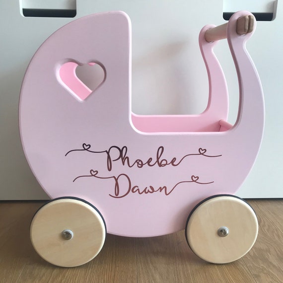 pink wooden dolls pram