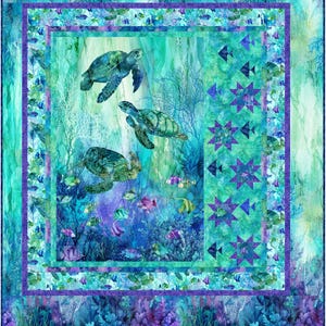 May include: A colorful quilt featuring an underwater scene with sea turtles, fish, and coral. The quilt has a teal, blue, and purple color scheme. The turtles are green and brown, and the fish are various colors. The quilt has a square shape.