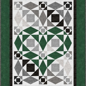 May include: A green, black and grey geometric pattern quilt with a heart shape in the centre. The quilt is framed with a dark green border.
