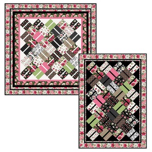 May include: Two quilt patterns with a black and white background and pink, green, and white floral fabric. The patterns are both a diamond shape with a border of pink and white floral fabric.