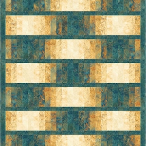 May include: A quilt with a geometric pattern of teal, beige and brown squares. The quilt is made of fabric with a textured, marbled look.