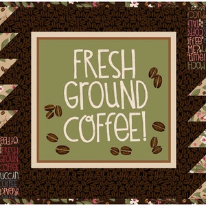 May include: A green and brown sign with the text "FRESH GROUND COFFEE!" in white. The sign is surrounded by a brown background with a pattern of coffee beans.