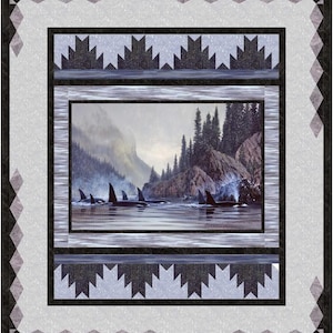 May include: A framed print depicting a scenic landscape with a pod of orcas swimming in the water. The scene is set in a misty, forested bay with rocky cliffs and a mountain in the background.