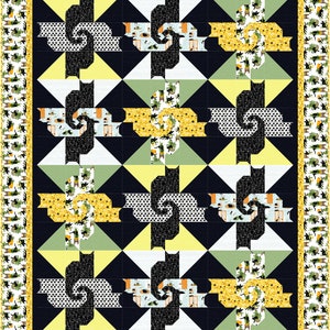 May include: A quilt with a black, white, yellow, and green geometric pattern. The pattern is made up of repeating swirls and squares. The quilt is bordered with a black and white pattern of cats.