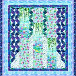 May include: A quilt with a blue, white, and green floral pattern. The quilt is made up of squares and triangles, and the pattern is repeated throughout the quilt.