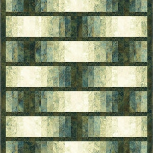May include: A quilt with a geometric pattern of green, blue, and white squares. The quilt is made of fabric with a textured, marbled look.