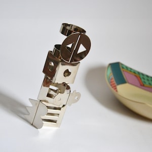 From 14.- Euro 1980s Bodum napkin rings Postmodern Design Nathalie du Pasquier Memphis stainless steel table decoration eighties gift chef
