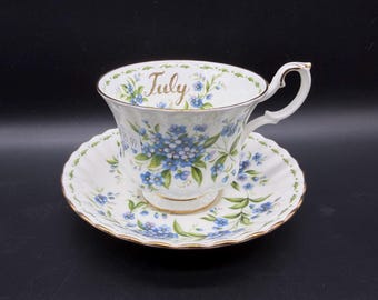 Juego de taza y platillo Royal Albert Flor del Mes de Julio Nomeolvides - Inglaterra