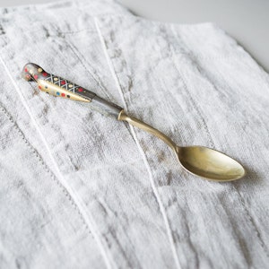 Decorative brass spoon Duck figurine Food photo prop