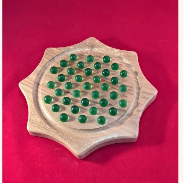 SOLITAIRE game, star shape, board game, 37 BBS, French version, solid walnut, varnished finish, waxed.