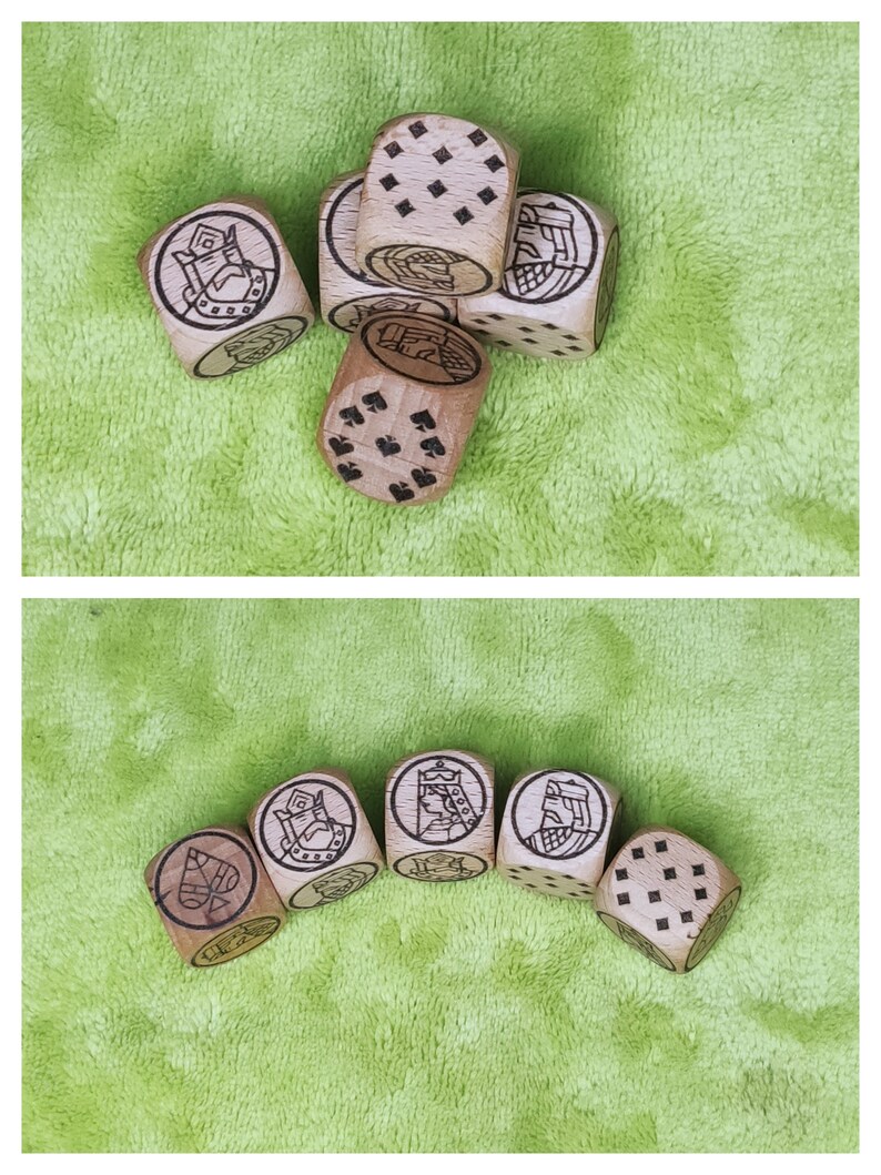 May include: A set of wooden dice with various symbols and designs, including a spade, a king, and a queen. The dice are brown and have black markings.