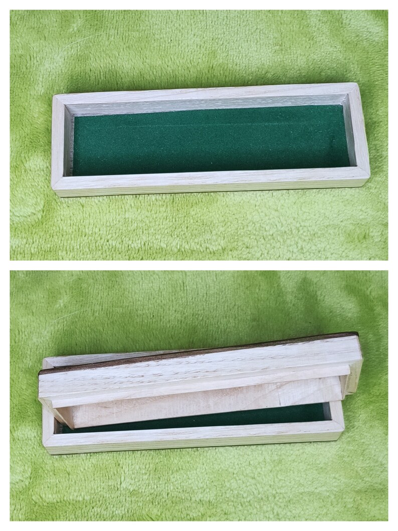 May include: A wooden box with a hinged lid. The box is lined with green felt. The lid is open and the box is empty.