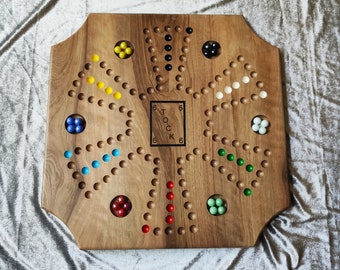 jeu de tock 4 et 6 joueurs plateau reversible en bois massif fabrication sur commande jeu de société billes en verre personnalisable.
