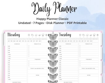 May include: A pink and white daily planner with a silver disk binding. The planner has a section for Monday and Tuesday with space for scheduling, to-do lists, notes, and tracking mood and water intake.