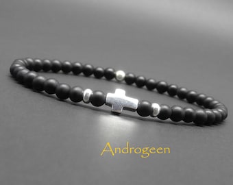 May include: Black beaded bracelet with a silver cross charm.
