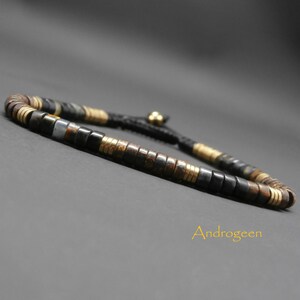 Smalt herrarmband, ädelstenar, hököga heishi, bronzit, onyx, guldhematit rondeller Ø4 mm R433