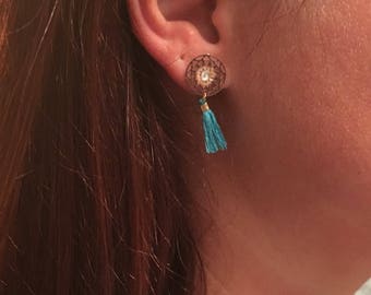 Turquoise pompom earrings and gold metal print