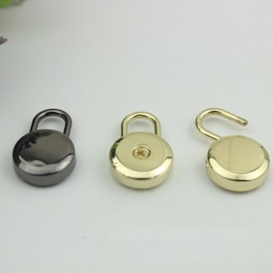 Runde Keyless Switch Vorhängeschloss 28 mm Charme Veranstalter Gepäck Hardware Gold Verschluss Kleine Tasche Kupplung Metall Accessoires Großverkauf