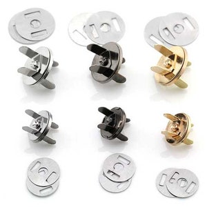 May include: Set of magnetic snap closures in silver, black, and gold. Each closure includes a pair of snaps and two metal discs. The snaps have four prongs and are designed for attaching fabric or leather.