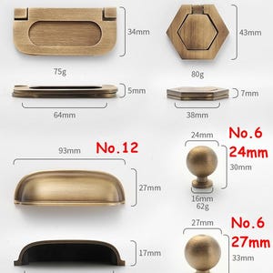 May include: A collection of antique brass cabinet hardware, including handles and knobs. The image shows various shapes and sizes, with measurements in millimeters and weights in grams. The hardware includes a rectangular handle (74mm), a hexagonal handle (50mm), and two styles of round knobs.