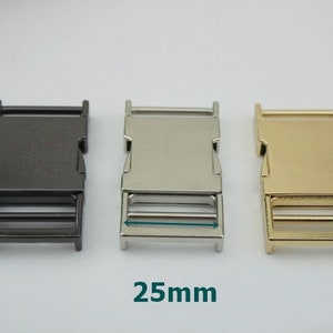 May include: Three 25mm plastic side release buckles in black, silver, and gold.