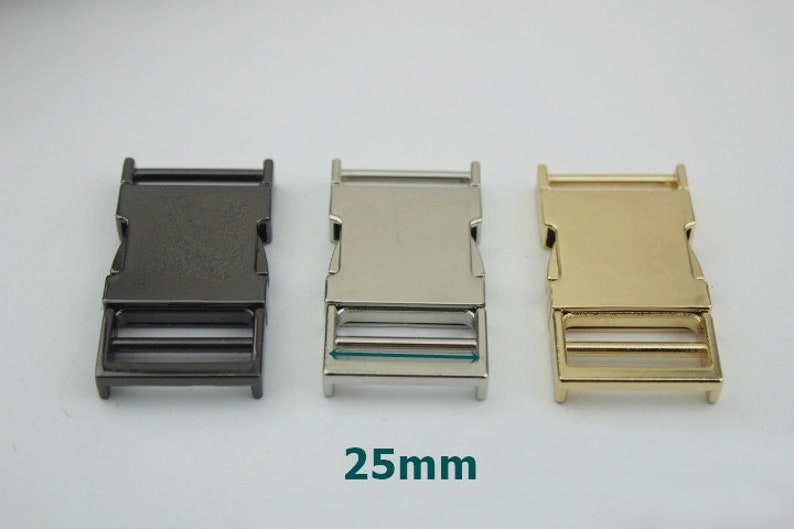 May include: Three 25mm plastic side release buckles in black, silver, and gold.