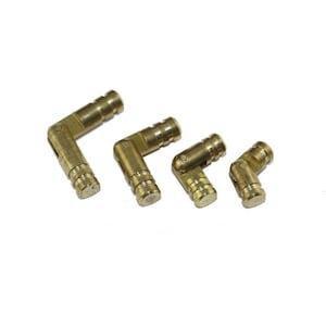 May include: Four brass-coloured, right-angle hinges of varying sizes are arranged diagonally on a white background. Each hinge has a cylindrical body with a ribbed texture and a pivoting joint. The hinges appear to be new and unused.