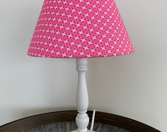 Conical day abatat colored pink white with white patinated foot