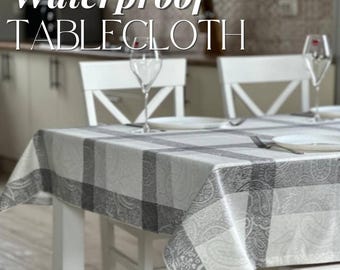 Proteja su mesa con estilo: Mantel impermeable artesanal con adorno. Elija entre varios colores para un look personalizado.