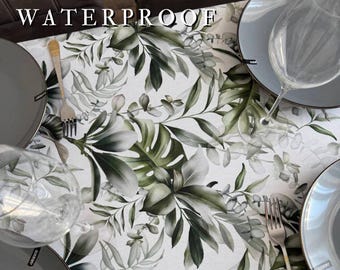 Mantel impermeable estilo cottagecore. Este efecto retiene los líquidos en la superficie. Mantel personalizado de hule. Mantel de exterior de teflón.