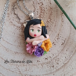 Polymer clay doll pendant. Polymer clay doll. Flower doll jewelry. Pendant necklace. Handmade. Original island doll necklace.