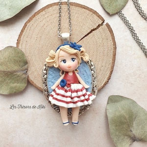 Polymer clay doll pendant. Polymer clay doll. Spring doll jewelry. Pendant necklace. Handmade. Original holiday doll necklace.