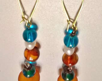 boucles d'oreille ambresl perles d'eau verre bleu